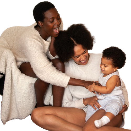 Two moms and a baby sharing a joyful moment